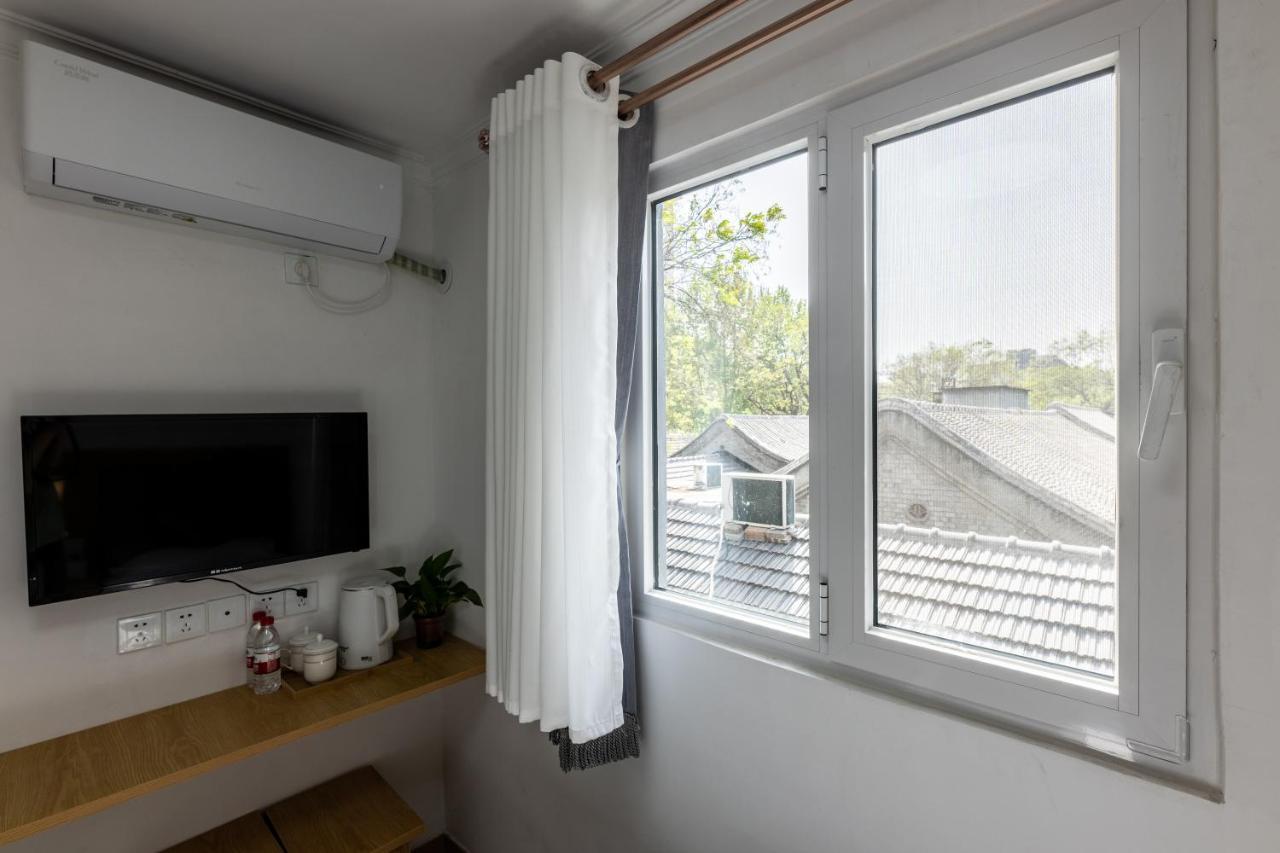 Happy Dragon Hotel -- Nearby Tiananmen Square & Forbidden City & Wangfujing Street & Line 5,6,8 Subway Nearby & Free Coffee & Free Laundry & Fluent English Speaking & Tourist Attractions Ticket Service & Free Wifi Unlimited For Western Software Peking  Buitenkant foto